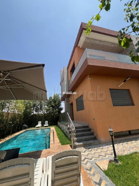 Location saisonnière villa de luxe à Route de Tahanaout. Surface de 410 m². Résidence avec concierge, climatisation générale - Vente Immobilier - Marrakech - photo 1
