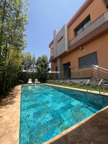 location-saisonniere-villa-de-luxe-a-route-de-tahanaout-surface-de-410-m2-residence-avec-concierge-climatisation-generale-big-18