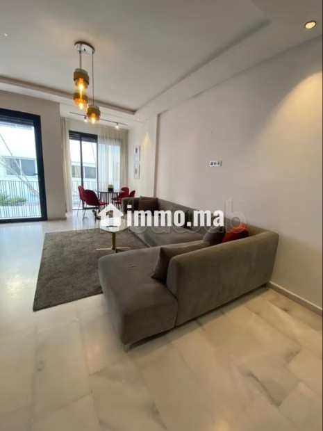 Location d'un appartement à Beauséjour. Superficie 45 m². Prestation de conciergerie, air conditionné - Vente Immobilier - Casablanca - photo 2