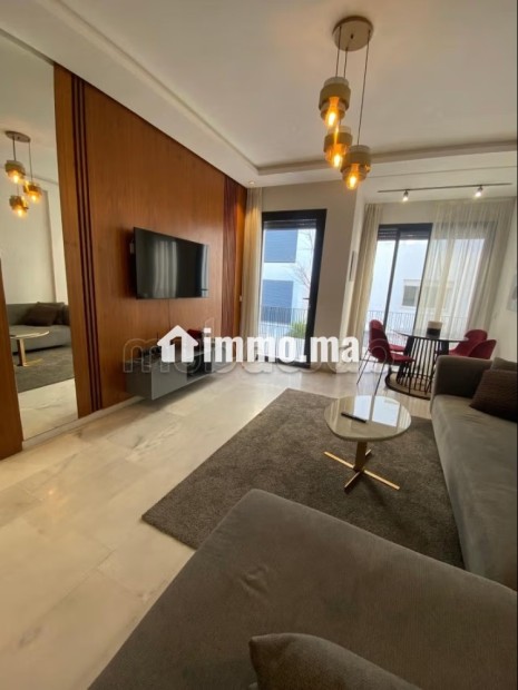 Location d'un appartement à Beauséjour. Superficie 45 m². Prestation de conciergerie, air conditionné - Vente Immobilier - Casablanca - photo 3