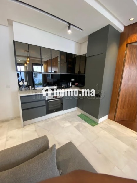 Location d'un appartement à Beauséjour. Superficie 45 m². Prestation de conciergerie, air conditionné - Vente Immobilier - Casablanca - photo 4
