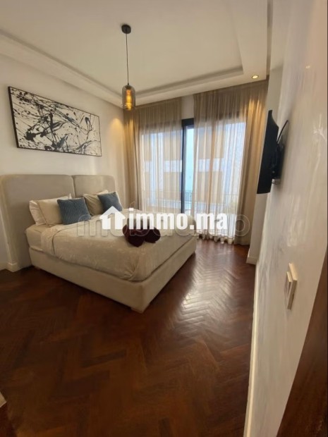 Location d'un appartement à Beauséjour. Superficie 45 m². Prestation de conciergerie, air conditionné - Vente Immobilier - Casablanca - photo 5