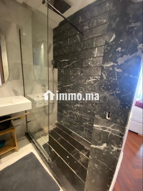 Location d'un appartement à Beauséjour. Superficie 45 m². Prestation de conciergerie, air conditionné - Vente Immobilier - Casablanca - photo 7