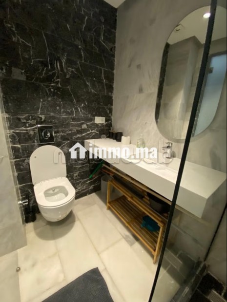 Location d'un appartement à Beauséjour. Superficie 45 m². Prestation de conciergerie, air conditionné - Vente Immobilier - Casablanca - photo 8