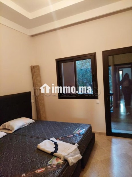 Vente d'un bel appartement à Route Casablanca.
Surface de 90 m².
Meublé - Vente Immobilier - Marrakech - photo 7