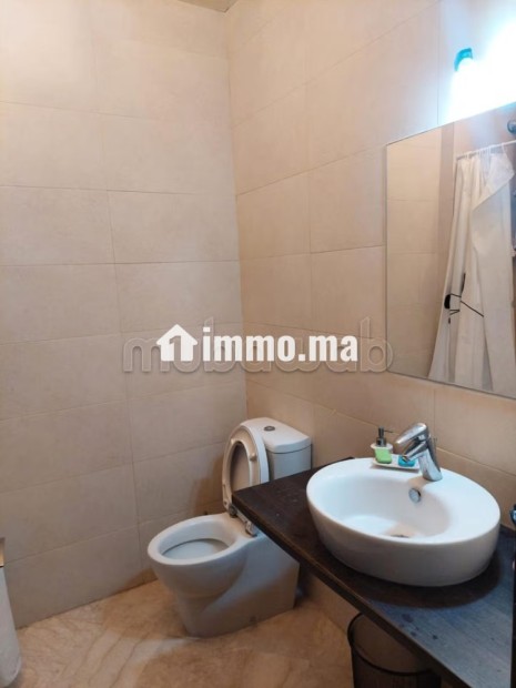 Vente d'un bel appartement à Route Casablanca.
Surface de 90 m².
Meublé - Vente Immobilier - Marrakech - photo 8