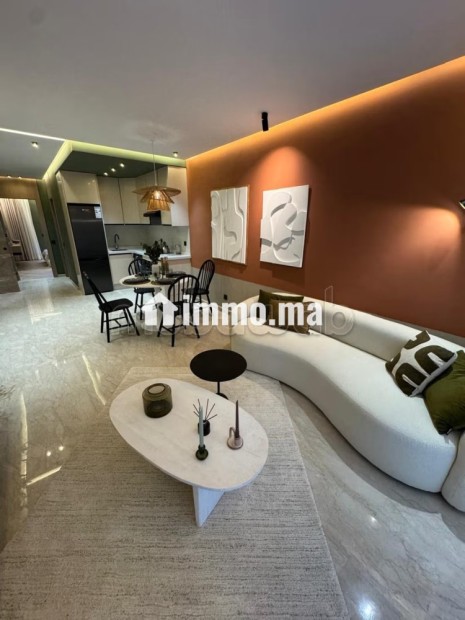 Vend appartement à Palmier. Surface de 59 m². Air conditionné et cheminée - Vente Immobilier - Casablanca - photo 1