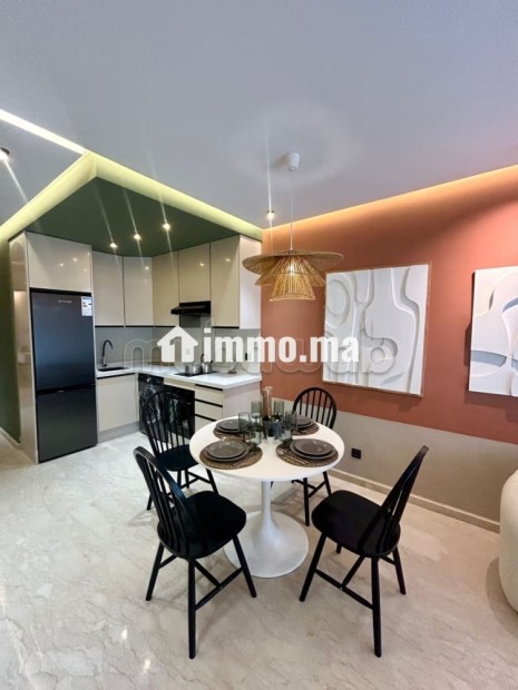 Vend appartement à Palmier. Surface de 59 m². Air conditionné et cheminée - Vente Immobilier - Casablanca - photo 2