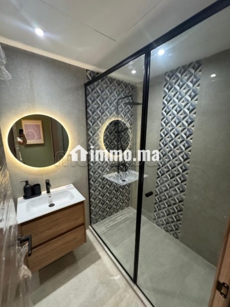 Vend appartement à Palmier. Surface de 59 m². Air conditionné et cheminée - Vente Immobilier - Casablanca - photo 4
