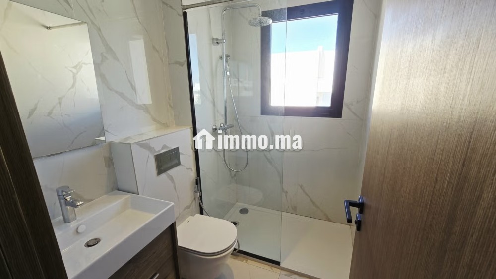 Appartement 110m² neuf à la ville verte - Location Immobilier - Bouskoura - photo 8