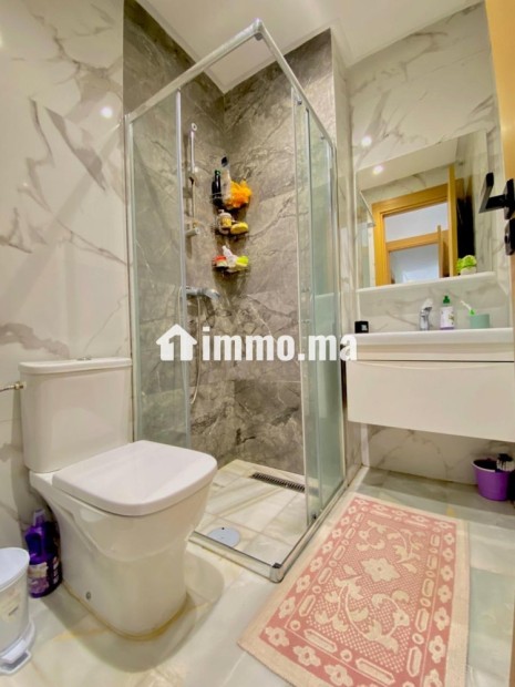 Appartement 2 chambres en résidence fermée - Location Immobilier - Casablanca - photo 4