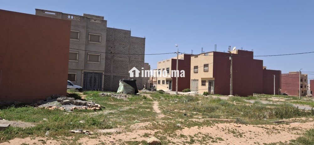 بقعة محفظة سكنية للبيع بتجزئة إشراق 87 متر - Vente Immobilier - Tiznit - photo 1