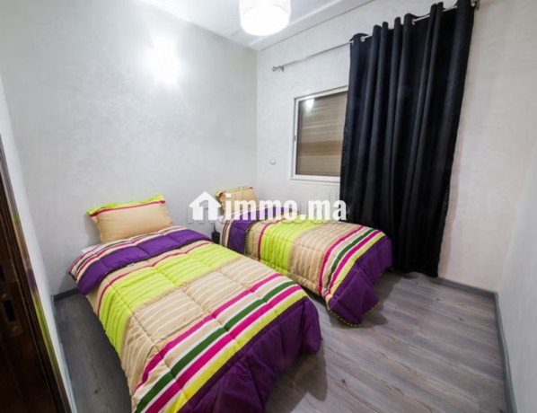 location-dun-appartement-a-agdal-4-pieces-terrasse-et-ascenseur-big-2