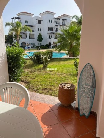 apartamento-con-jardin-privado-enfrente-la-piscina-big-0