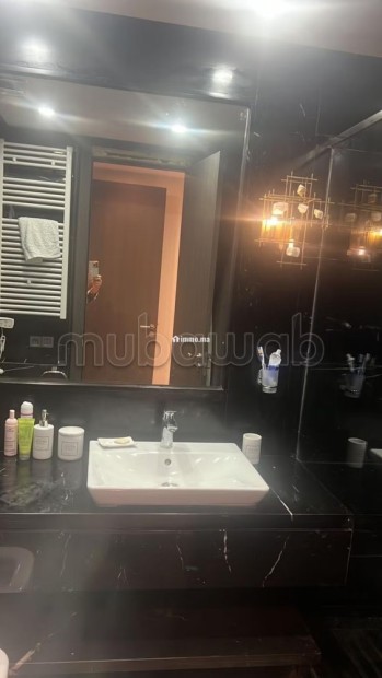 Location d'un appartement à Ain Diab. 2 chambres agréables. Meublé - Location Immobilier - Casablanca - photo 8