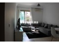 racine-1-chambre-salon-moderne-et-ensoleille-small-0