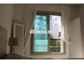 racine-1-chambre-salon-moderne-et-ensoleille-small-3