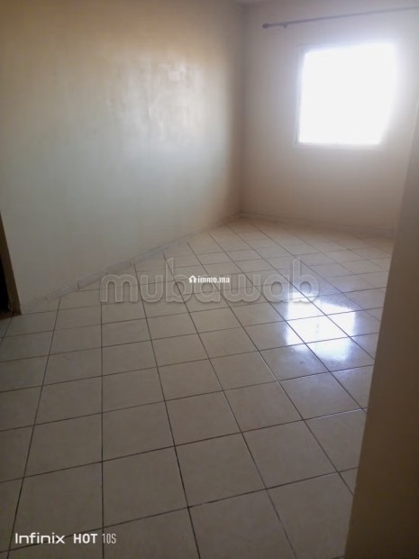 Location d'un appartement à Maghreb Arabi. Surface totale 54 m². Antenne parabolique et sécurité - Location Immobilier - Temara - photo 1