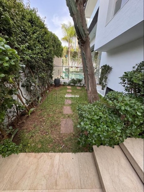 Magnifique villa à vendre à Ain Diab.
Surface de 450 m².
Bien meublé - Vente Immobilier - Casablanca - photo 7