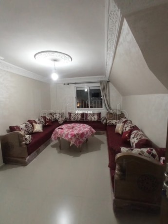 superbe-appartement-a-louer-a-lotissement-en-phase-damenagement-superficie-64-m2-salon-avec-decoration-marocaine-big-0