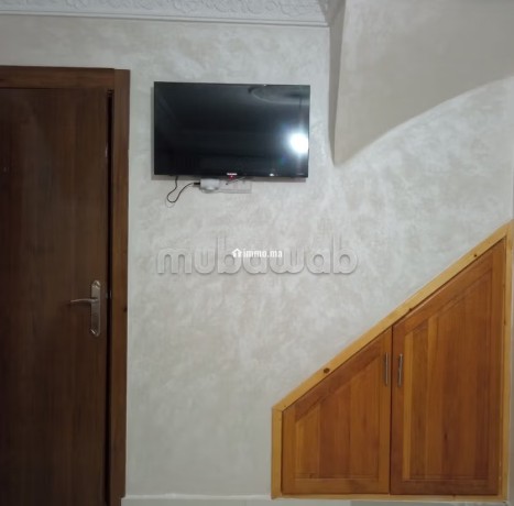 superbe-appartement-a-louer-a-lotissement-en-phase-damenagement-superficie-64-m2-salon-avec-decoration-marocaine-big-3