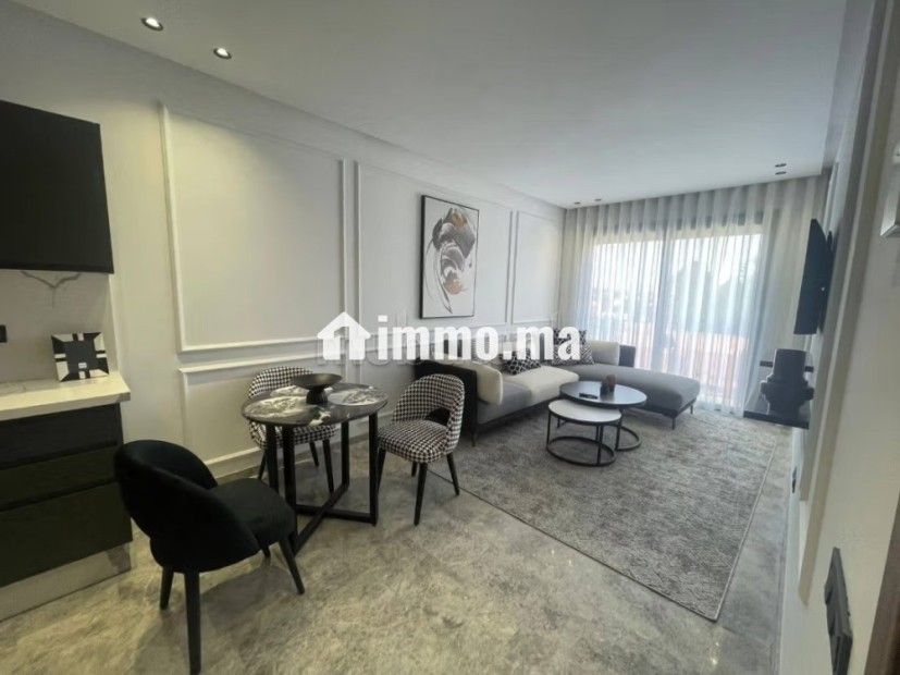 Superbe appartement à vendre à Oasis.
Surface de 52 m².
Cheminée et service de conciergerie - Vente Immobilier - Casablanca - photo 1