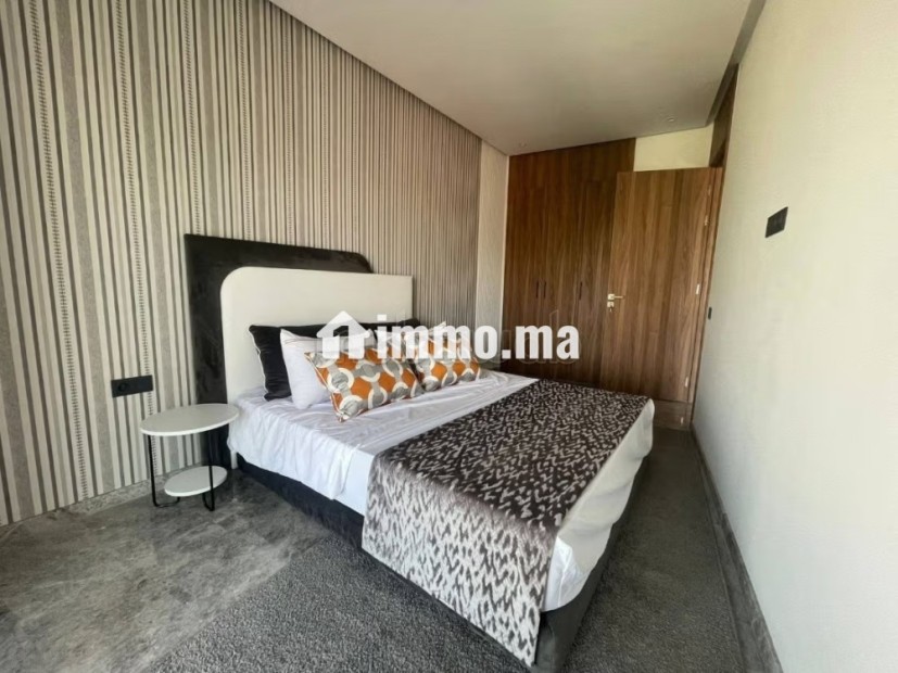 Superbe appartement à vendre à Oasis.
Surface de 52 m².
Cheminée et service de conciergerie - Vente Immobilier - Casablanca - photo 2