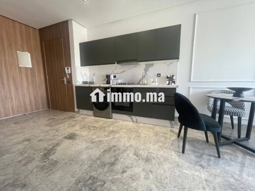 Superbe appartement à vendre à Oasis.
Surface de 52 m².
Cheminée et service de conciergerie - Vente Immobilier - Casablanca - photo 5
