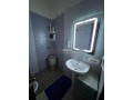 location-dun-appartement-a-tanja-balia-2-chambres-salon-traditionnel-et-porte-blindee-small-5