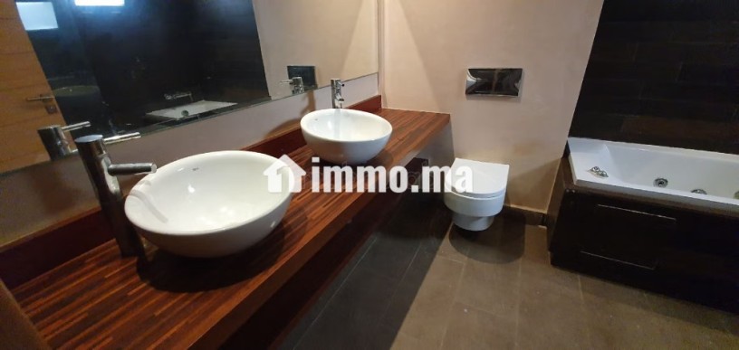 magnifique-villa-a-louer-a-ain-diab-extension-4-chambres-agreables-piscine-et-jardin-big-13