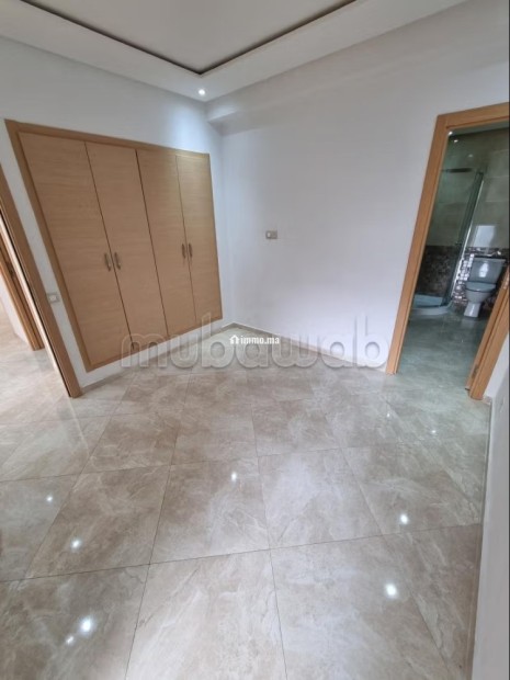 Vente d'un bel appartement à Hay Massira. 3 belles chambres. Prestation de conciergerie, air conditionné - Vente Immobilier - Agadir - photo 3