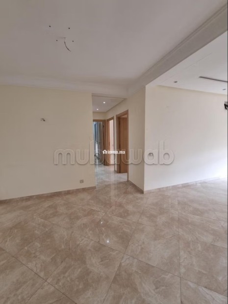 Vente d'un bel appartement à Hay Massira. 3 belles chambres. Prestation de conciergerie, air conditionné - Vente Immobilier - Agadir - photo 5