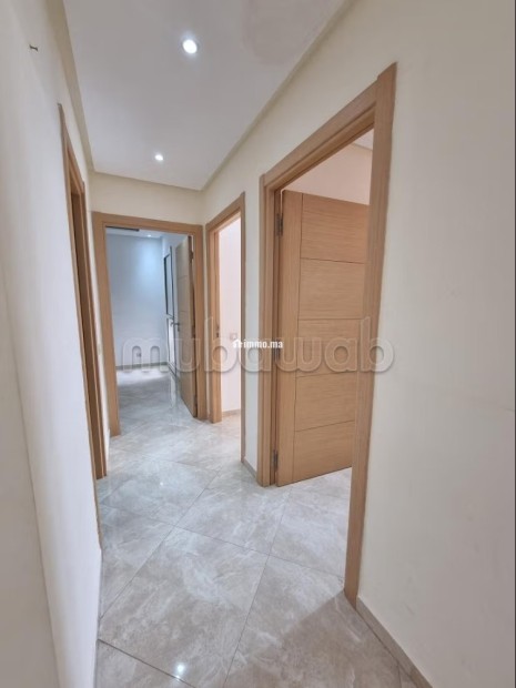 Vente d'un bel appartement à Hay Massira. 3 belles chambres. Prestation de conciergerie, air conditionné - Vente Immobilier - Agadir - photo 6