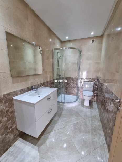Vente d'un bel appartement à Hay Massira. 3 belles chambres. Prestation de conciergerie, air conditionné - Vente Immobilier - Agadir - photo 7