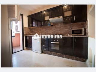 Location saisonnière à Ennakhil Palmeraie. Surface de 100 m². Espaces verts et ascenseur - Appartement à vendre