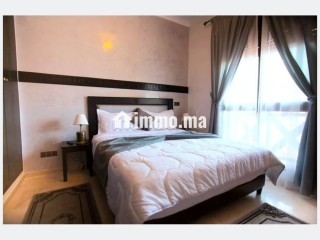 Location saisonnière à Ennakhil Palmeraie. Surface de 100 m². Espaces verts et ascenseur - Appartement à vendre