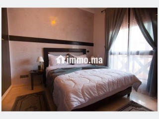 Location saisonnière à Ennakhil Palmeraie. Surface de 100 m². Espaces verts et ascenseur - Appartement à vendre