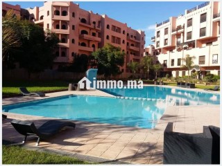 Location saisonnière à Ennakhil Palmeraie. Surface de 100 m². Espaces verts et ascenseur - Appartement à vendre