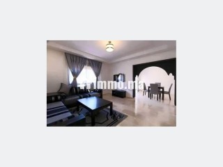 Location saisonnière à Ennakhil Palmeraie. Surface de 100 m². Espaces verts et ascenseur - Appartement à vendre