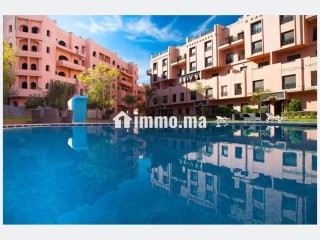 Location saisonnière à Ennakhil Palmeraie. Surface de 100 m². Espaces verts et ascenseur - Appartement à vendre
