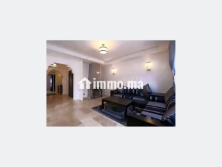 Location saisonnière à Ennakhil Palmeraie. Surface de 100 m². Espaces verts et ascenseur - Appartement à vendre