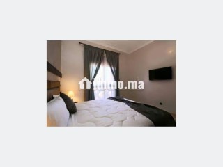 Location saisonnière à Ennakhil Palmeraie. Surface de 100 m². Espaces verts et ascenseur - Appartement à vendre