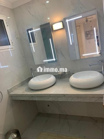 Un joli appartement en location meublé à Agdal - Location Immobilier - Rabat - photo 6