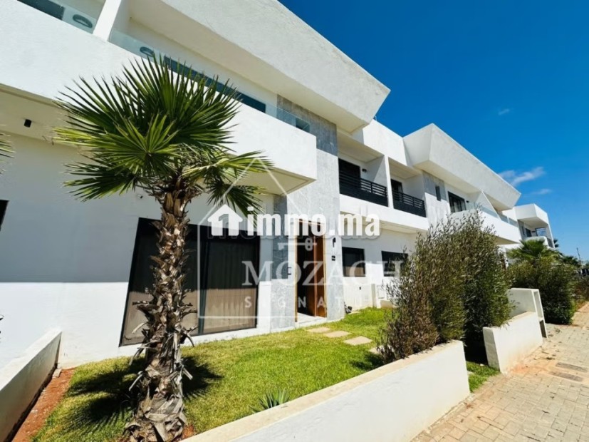 Petite villa 3 chambres sur résidence sécurisée - Location Immobilier - Dar Bouazza - photo 1
