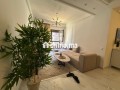 tres-bel-appartement-en-location-a-casablanca-finance-city-surface-de-100-m2-bien-meuble-small-1