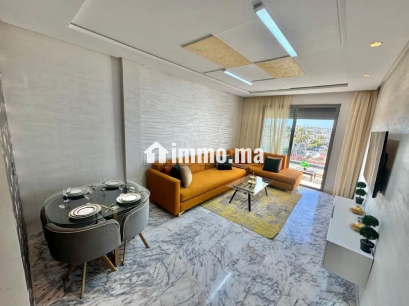 Location d'un appartement à Casablanca Finance City.
Surface de 100 m².
Antenne parabolique et sécurité - Vente Immobilier - Casablanca - photo 2