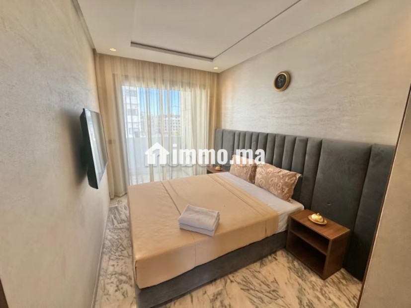 Location d'un appartement à Casablanca Finance City.
Surface de 100 m².
Antenne parabolique et sécurité - Vente Immobilier - Casablanca - photo 8
