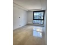 studio-neuf-vide-luxe-64m2-a-cfc-ss-vis-avis-small-1