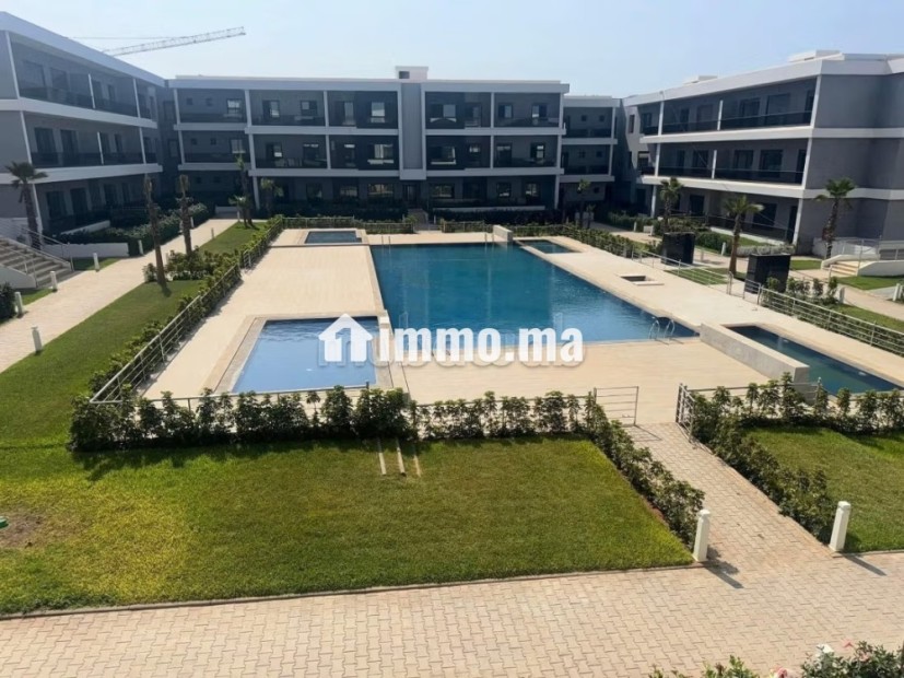 Superbe appartement à louer vide De 2 Chambres.
Balcon Garage et piscine - Location Immobilier - Dar Bouazza - photo 1