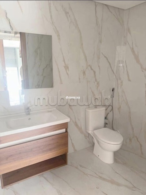 Superbe appartement à louer vide De 2 Chambres.
Balcon Garage et piscine - Location Immobilier - Dar Bouazza - photo 8